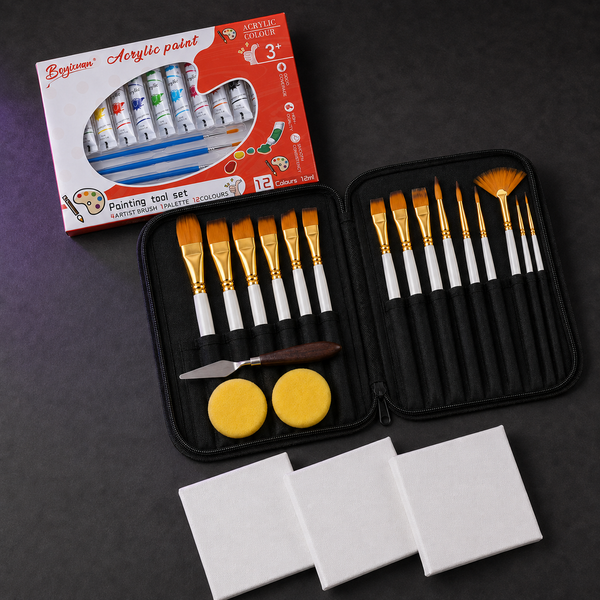 Portable Artist Case Bundle: a black zip case opened flat with fifteen brushes, a palette knife and two round sponges, beside a 12-colour paint carton and three small canvases.