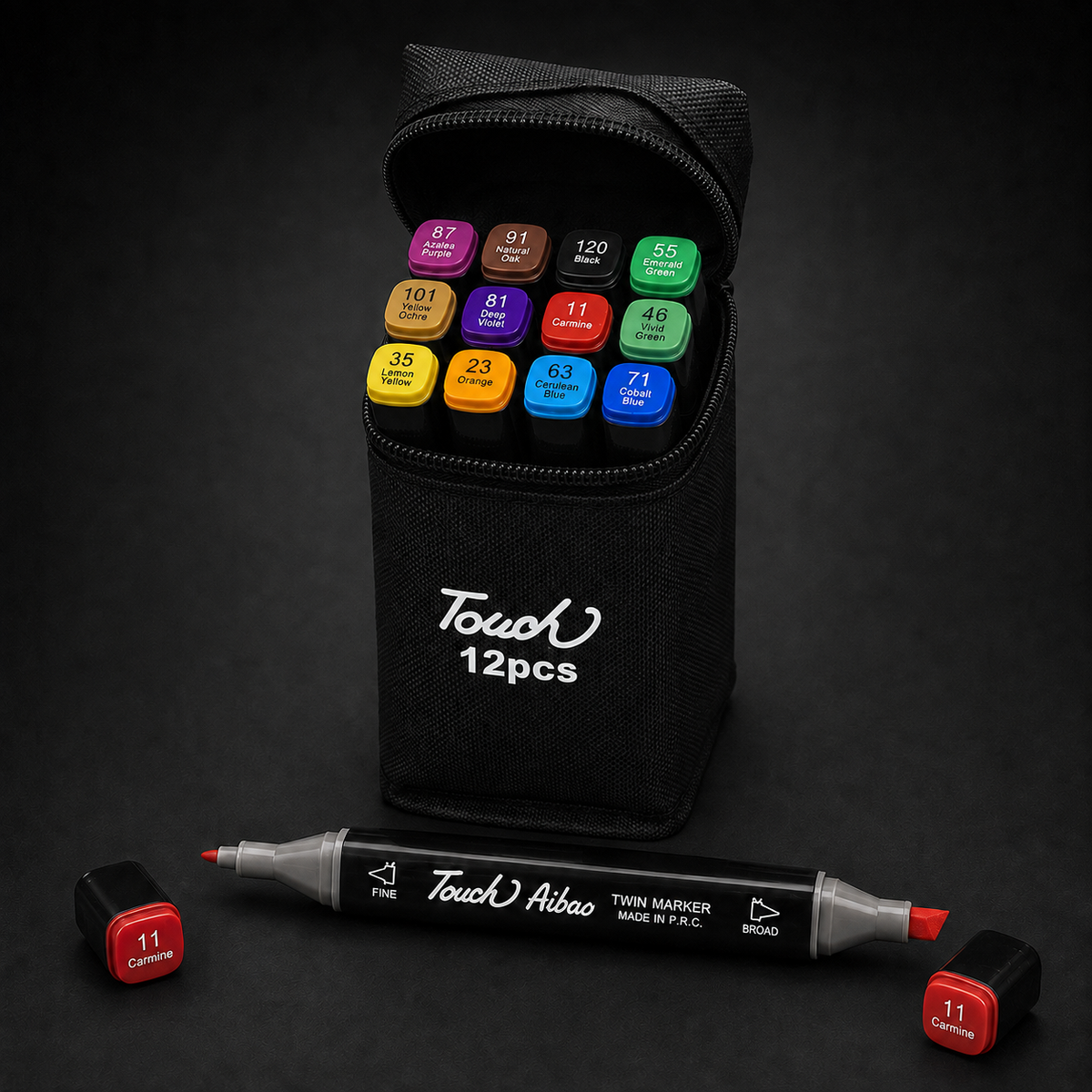 TOUCH 12 alcohol marker set open at a three-quarter angle, showing all 12 colour caps, with one Carmine twin marker in front