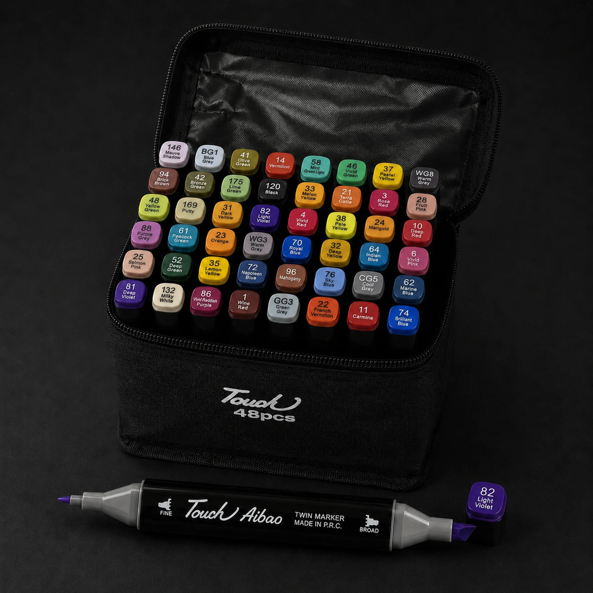 TOUCH 48 alcohol marker set open at a three-quarter angle, showing all 48 colour caps in the black case