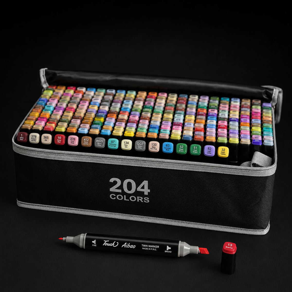 204-colour alcohol marker set open at a three-quarter angle, showing the full grid of caps in the carry case