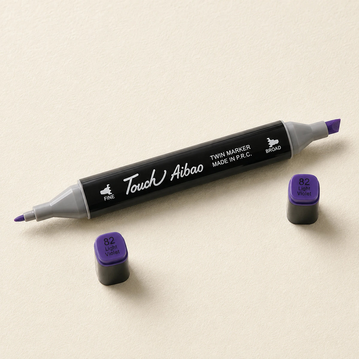 Single Touch Aibao twin marker in 82 Light Violet, caps off, showing the broad chisel nib and the fine bullet nib