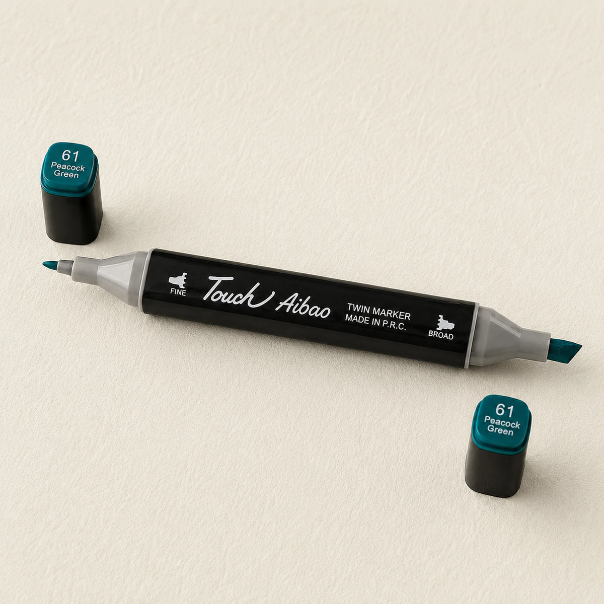 Single Touch Aibao twin marker in Peacock Green, caps off, showing the broad chisel nib and the fine bullet nib