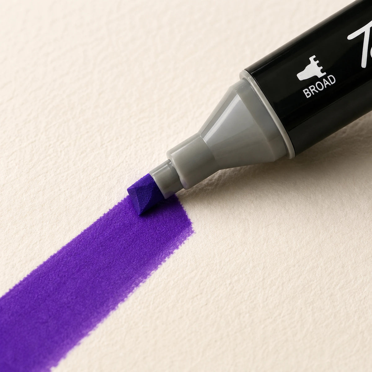 Broad chisel nib of a Touch Aibao marker laying a wide 82 Light Violet stroke across ivory art paper