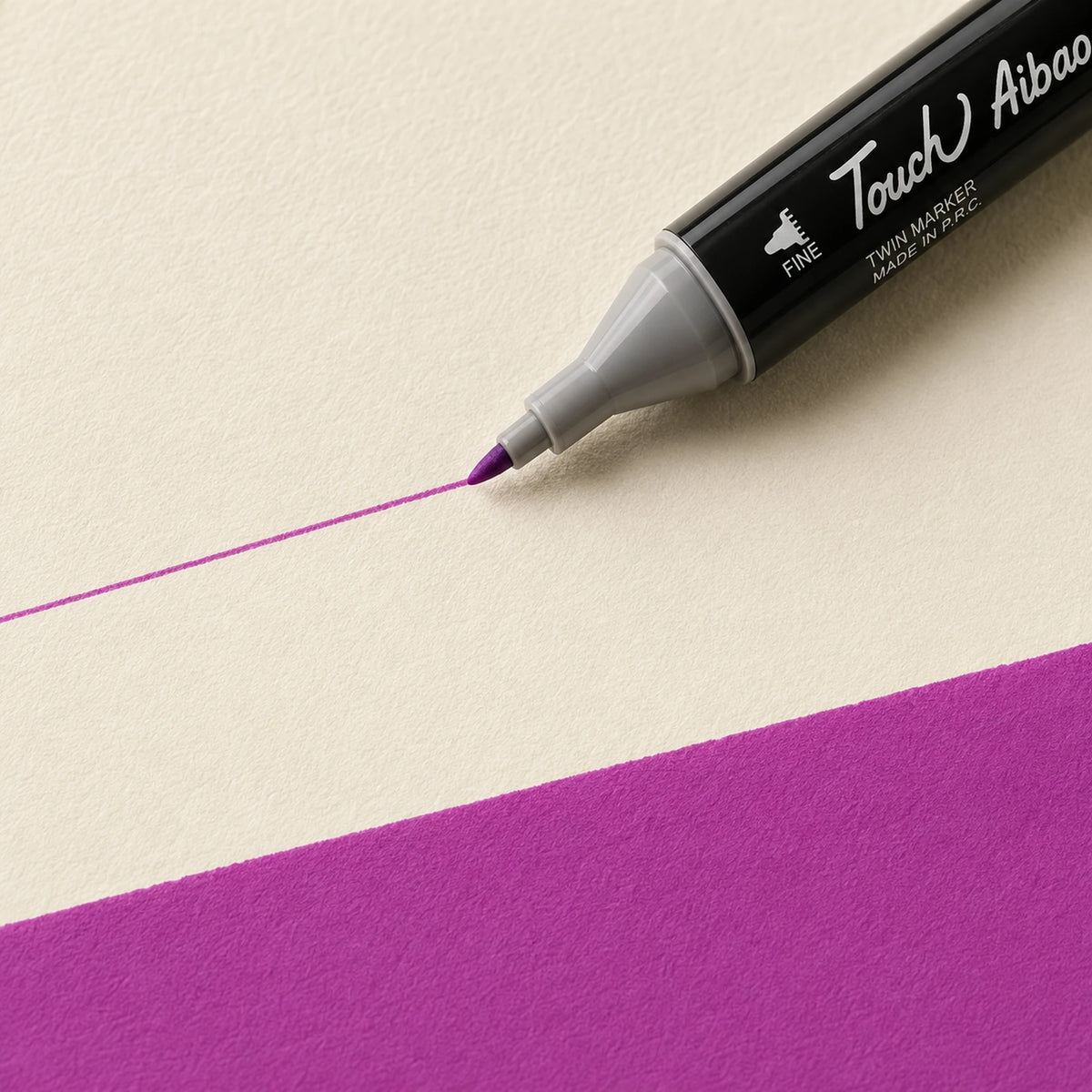Fine bullet nib drawing a crisp thin Azalea Purple alcohol marker line on ivory art paper