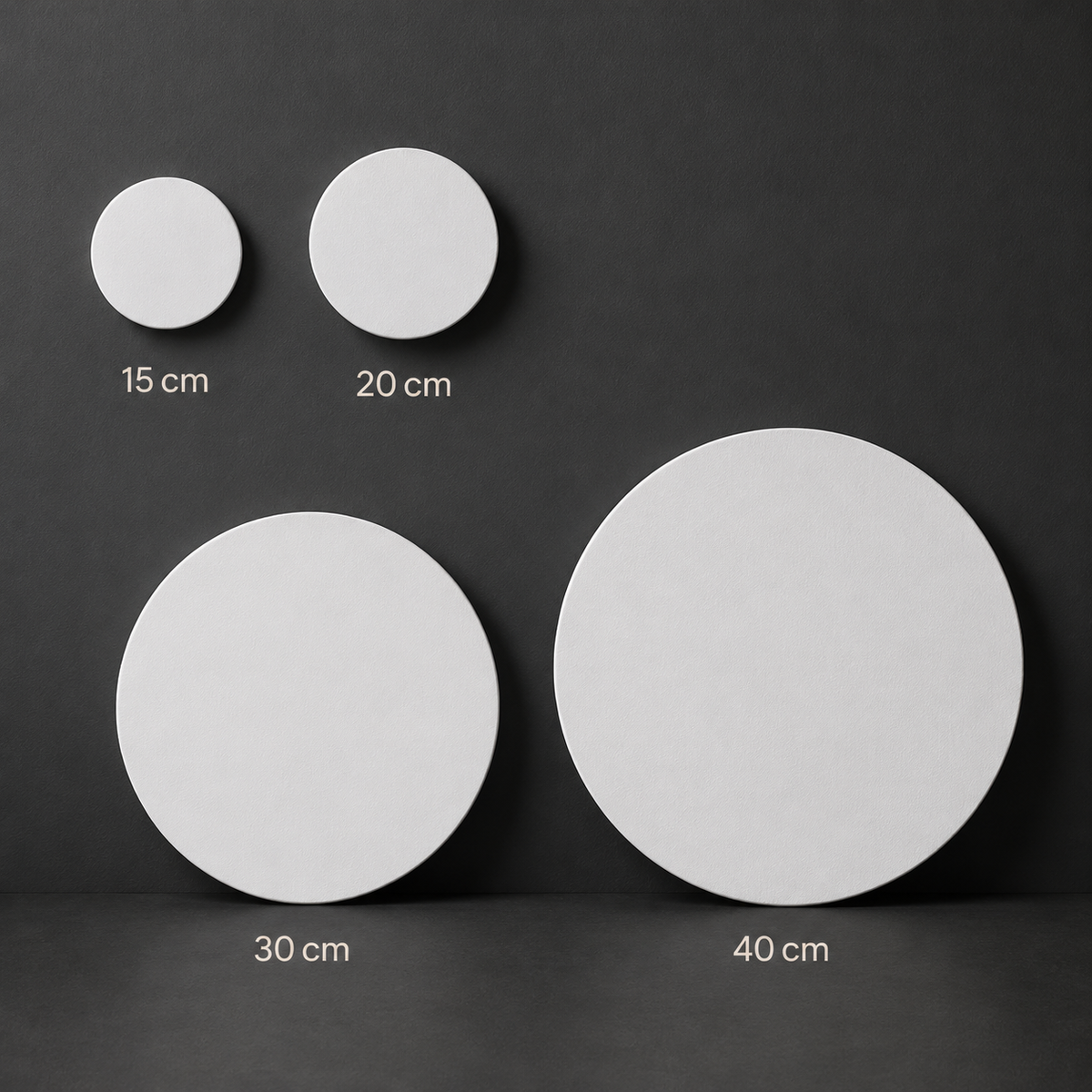 Round canvases showing depth and primed cotton surface, with size labels