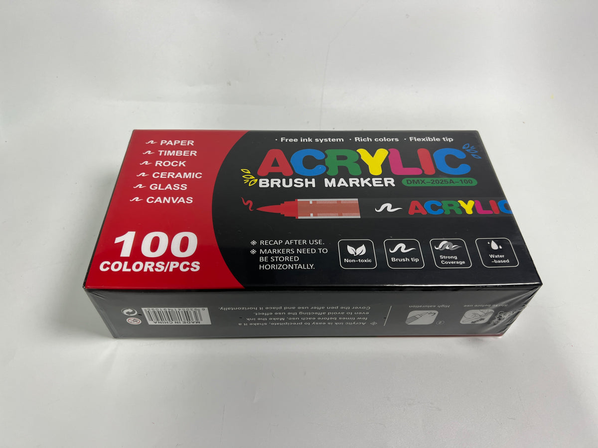The 100-colour acrylic marker box tilted to show the barcode and instructions printed on its back.