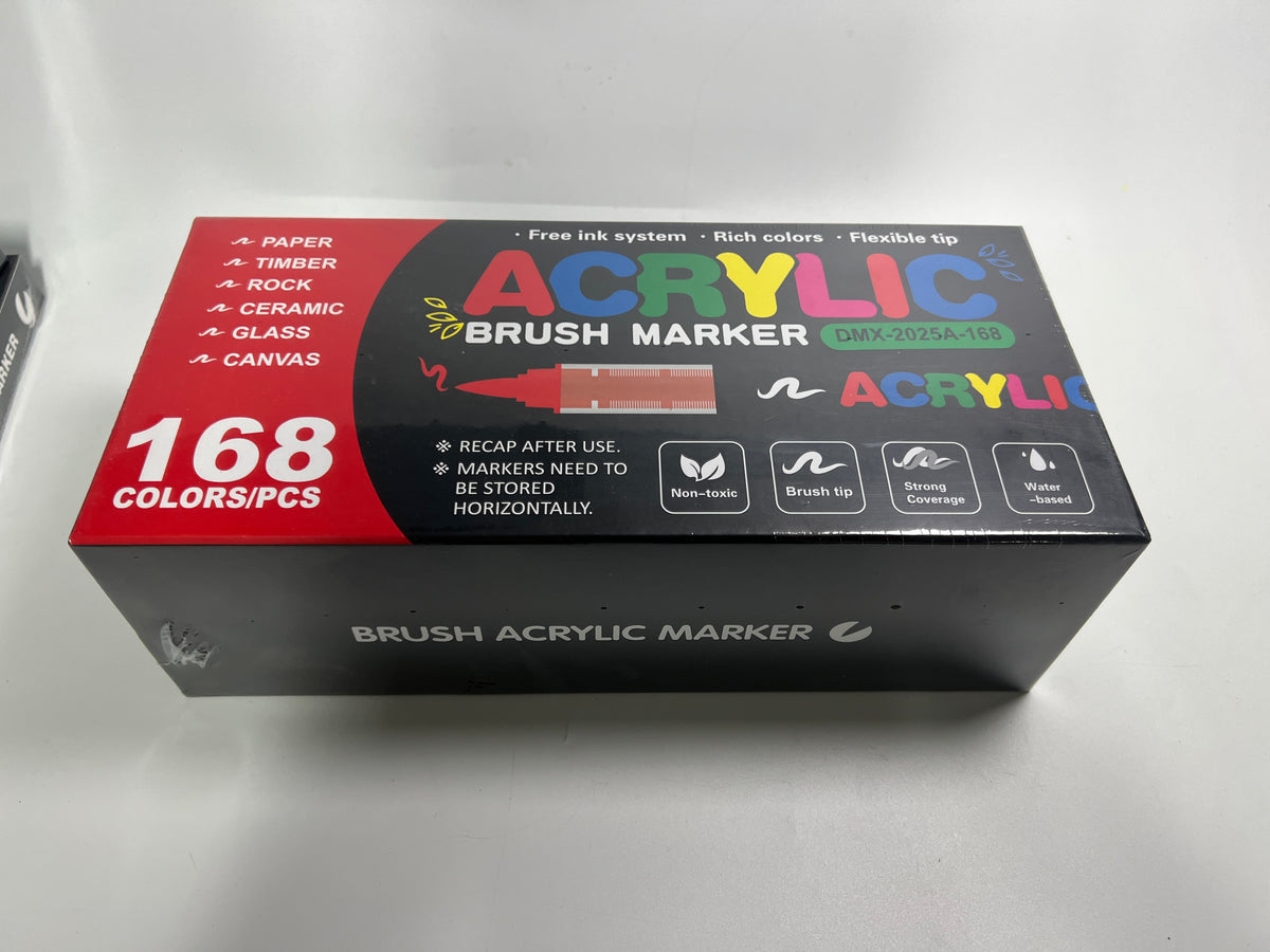 Supplier photograph of the 168-colour acrylic marker box angled to show its BRUSH ACRYLIC MARKER edge.