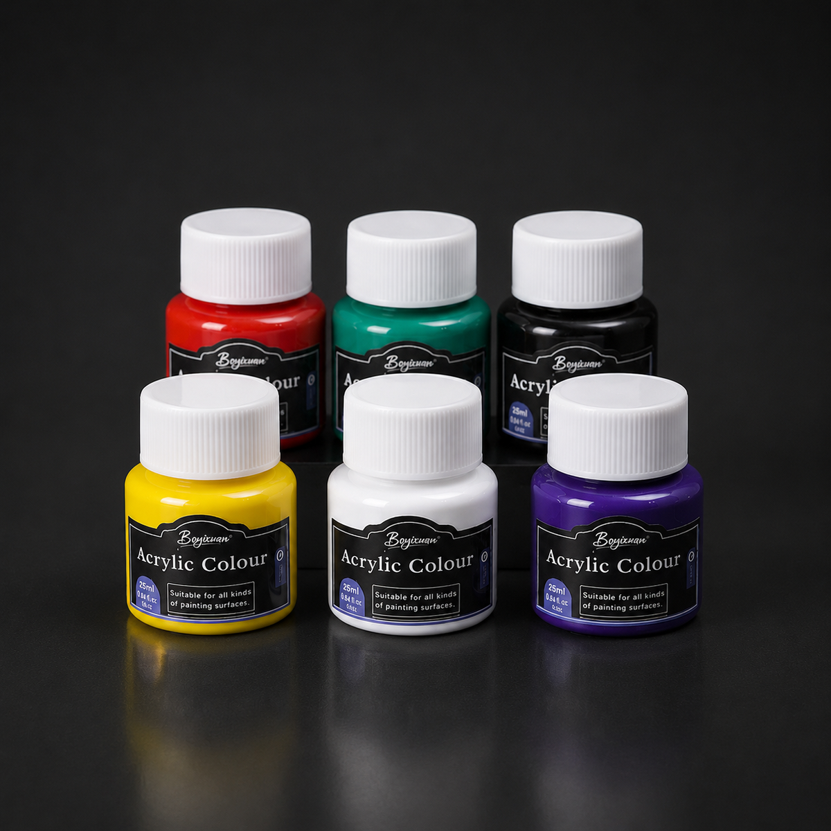 Six acrylic colour pots grouped, showing the screw lids and labels